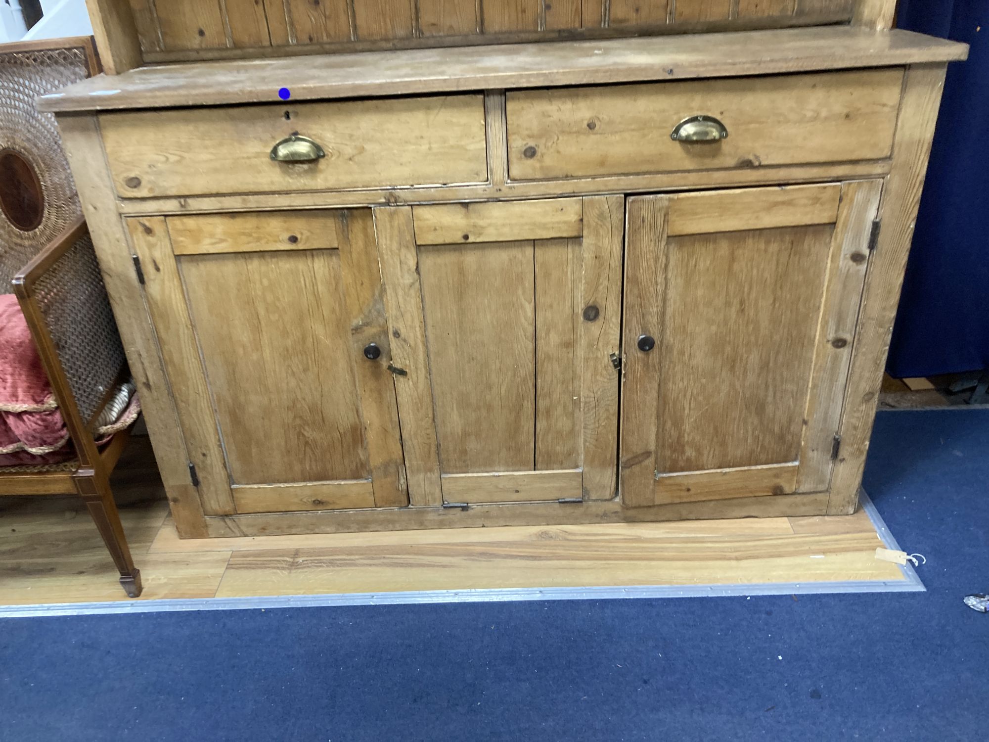 A Victorian pine dresser and rack, length 152cm, depth 42cm, height 212cm